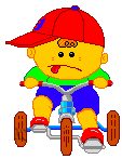 a boy riding a tricycle