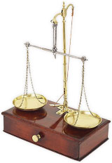 scales made of wood and brass